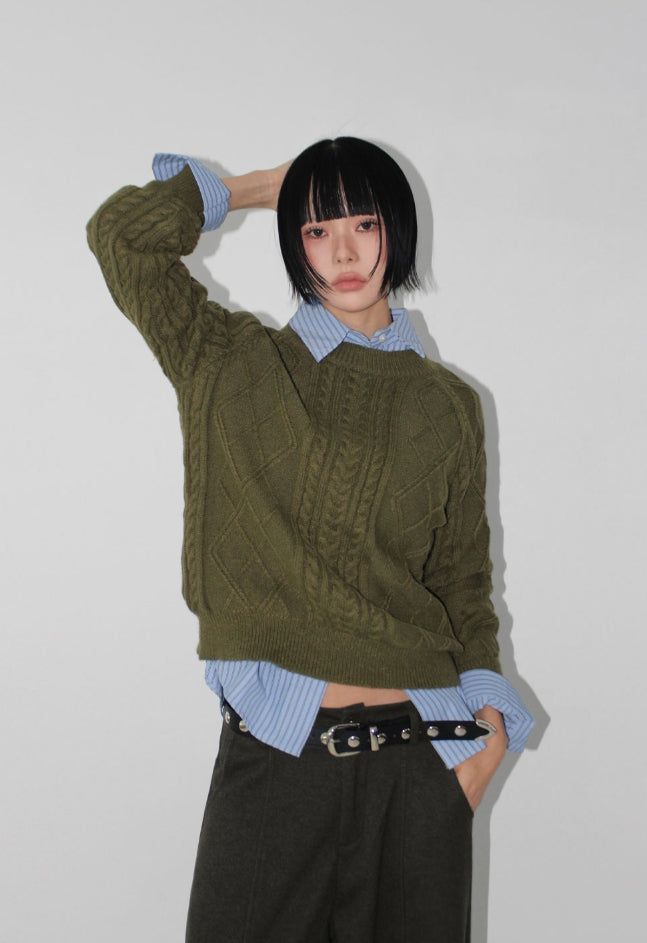 AAKE(アケ)の「CINNAMON CABLE KNIT(Tops)」