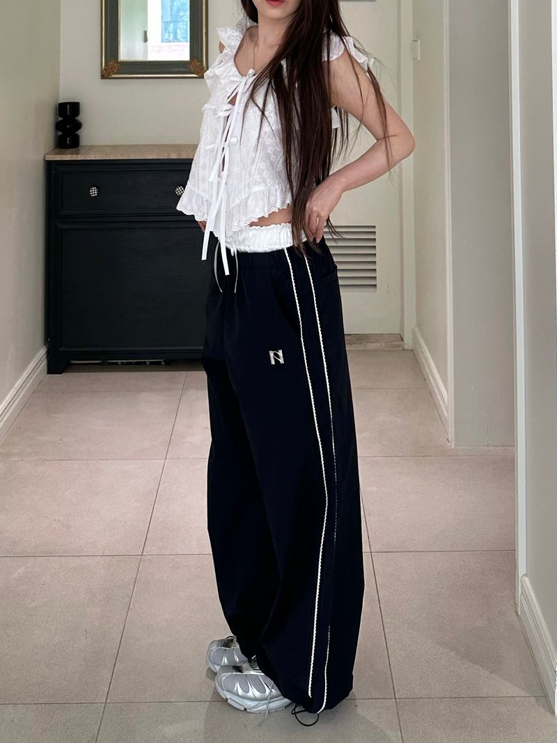 Newalrin emblem nylon wide Pants