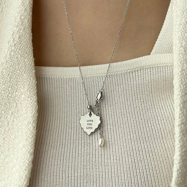 Acer rojo(アセルロジョ)の「hhi Big Heart Lettering Stainless Steel Titanium Ball Long Freshwater Pearl Layered Necklace(Accessories)」