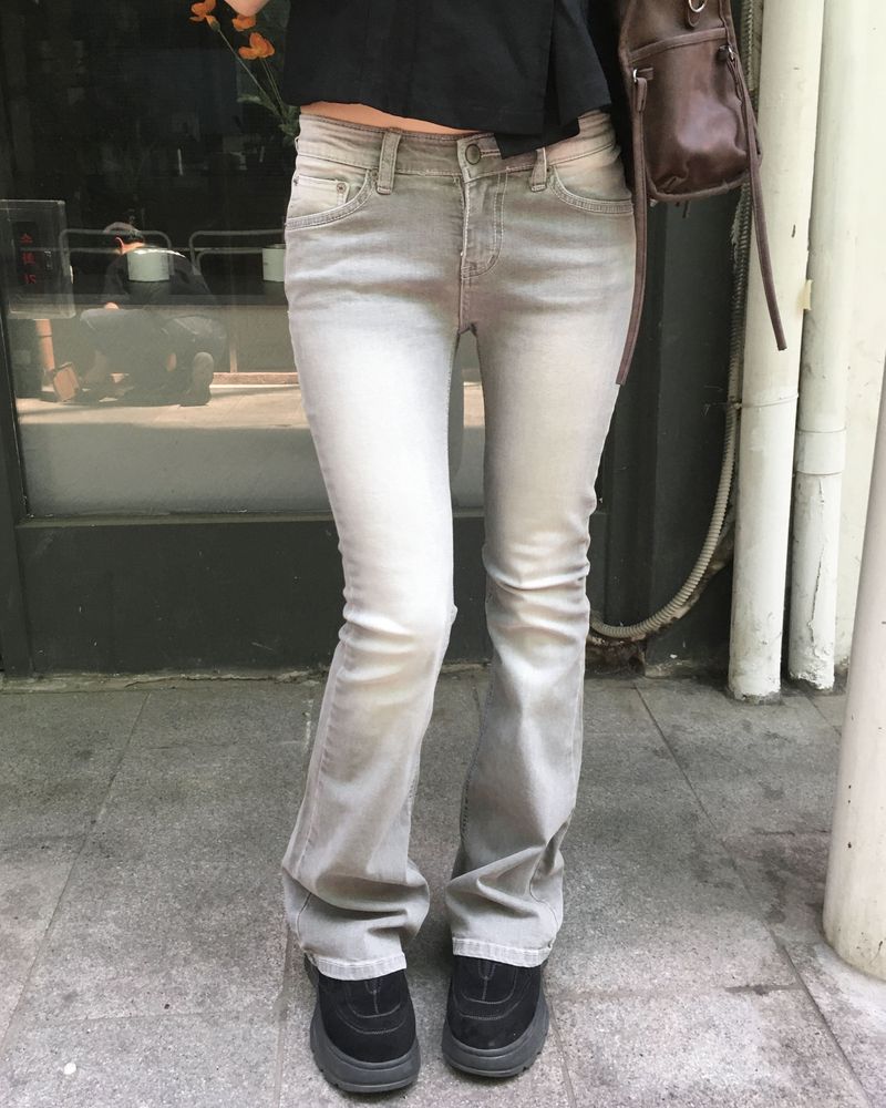 Grey lowrise boots cut pants