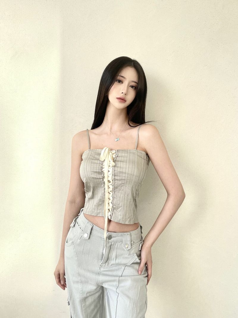 Seow（ソウ）の「1041. Stripe ribbon corset sleeveless (2color)（Tops）」