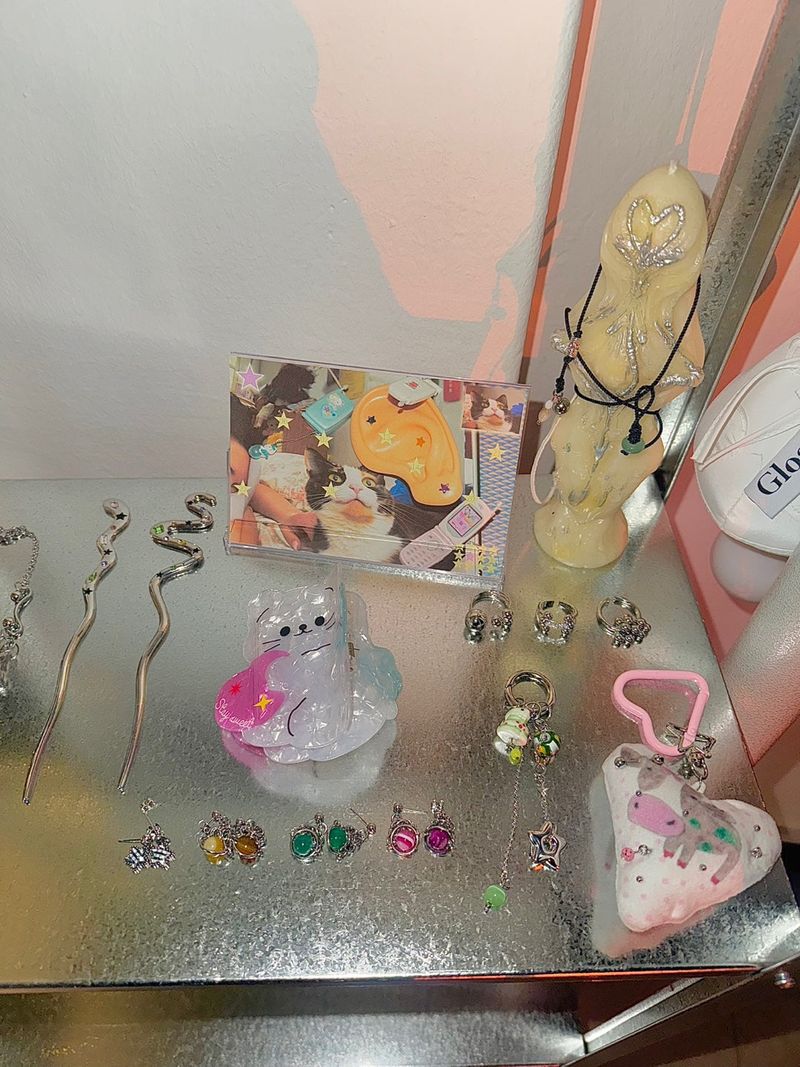 Pierced pinky cow keychain