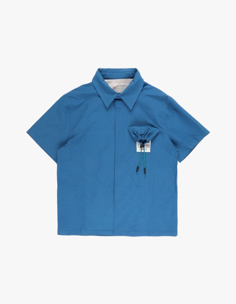 thewarld（ザワールド）の「PACKABLE SEERSUCKER HALF SHIRTS BLUE（Tops）」