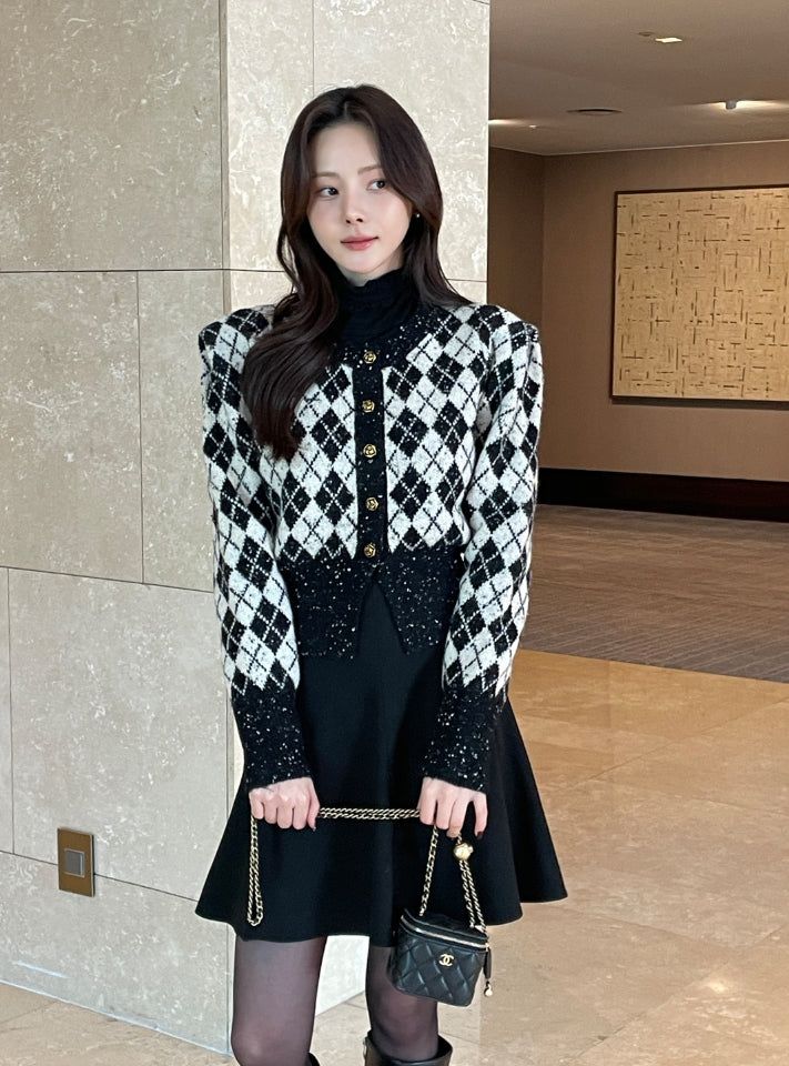 iam mari（アイアム マリ）の「Obel Argyle Puff Knit Cardigan（Tops）」