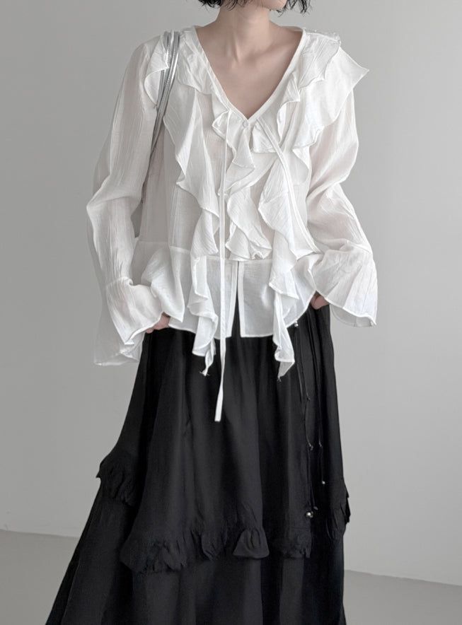 mnem（ムネム）の「Plumel Ruffle V-Neck Blouse（Tops）」