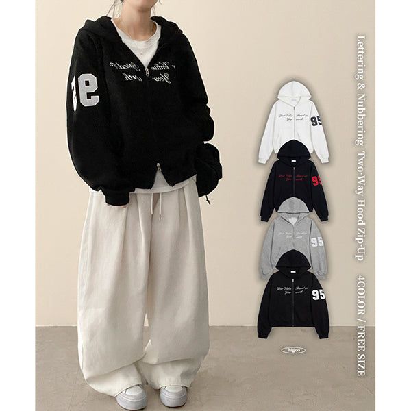 hijjoo（ハイチュー）の「Crew Number Patch Two-Way Overfit Hooded Zip-Up（Tops）」