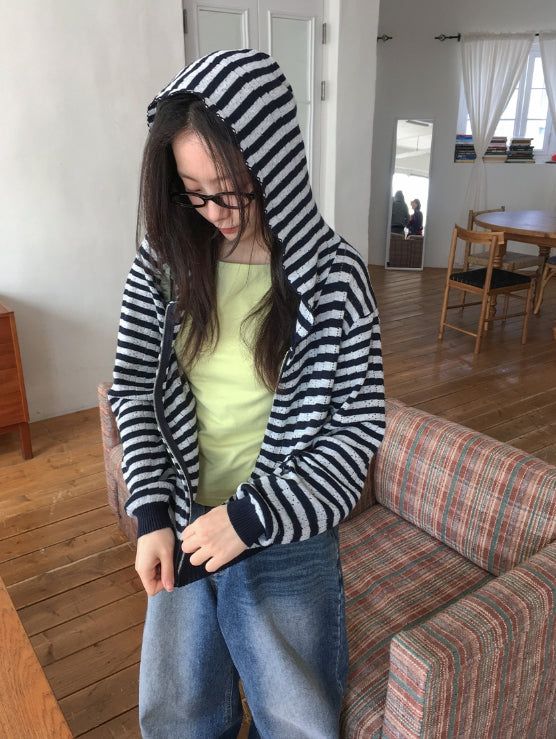 BAON(バオン)の「ユメヒボーダーパンチングフードジップアップカーディガン(トップス)」