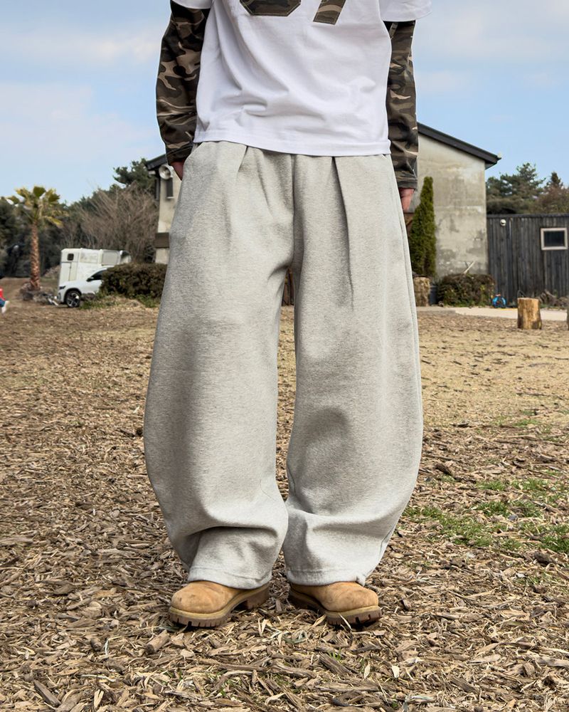 UA カモパッチワイドスウェットパンツ