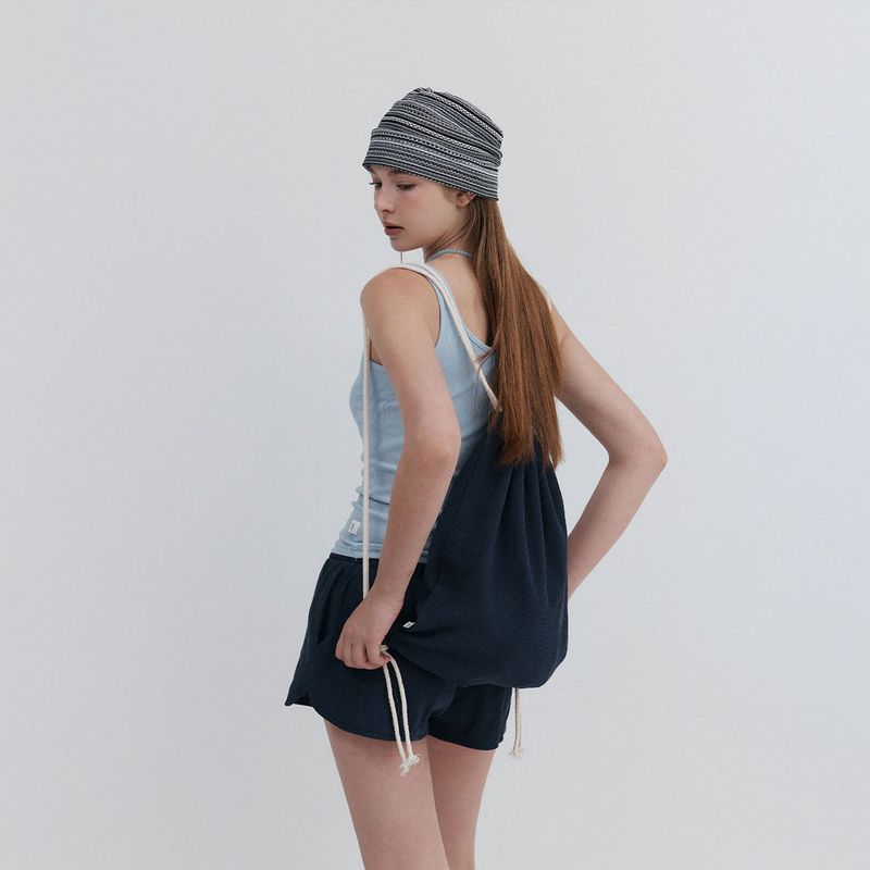 OONE（ウネ）の「【MADE】 ワッフルストリングジムサック_ネイビー（バッグ）」