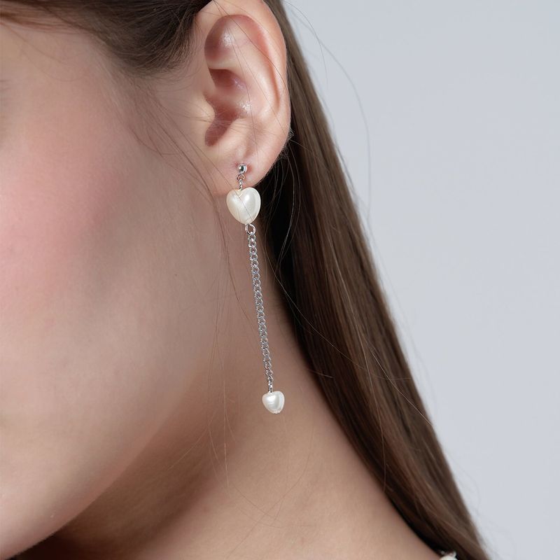 HAWHA(ハワ)の「WHITE HEART DROP EARRING(Accessories)」