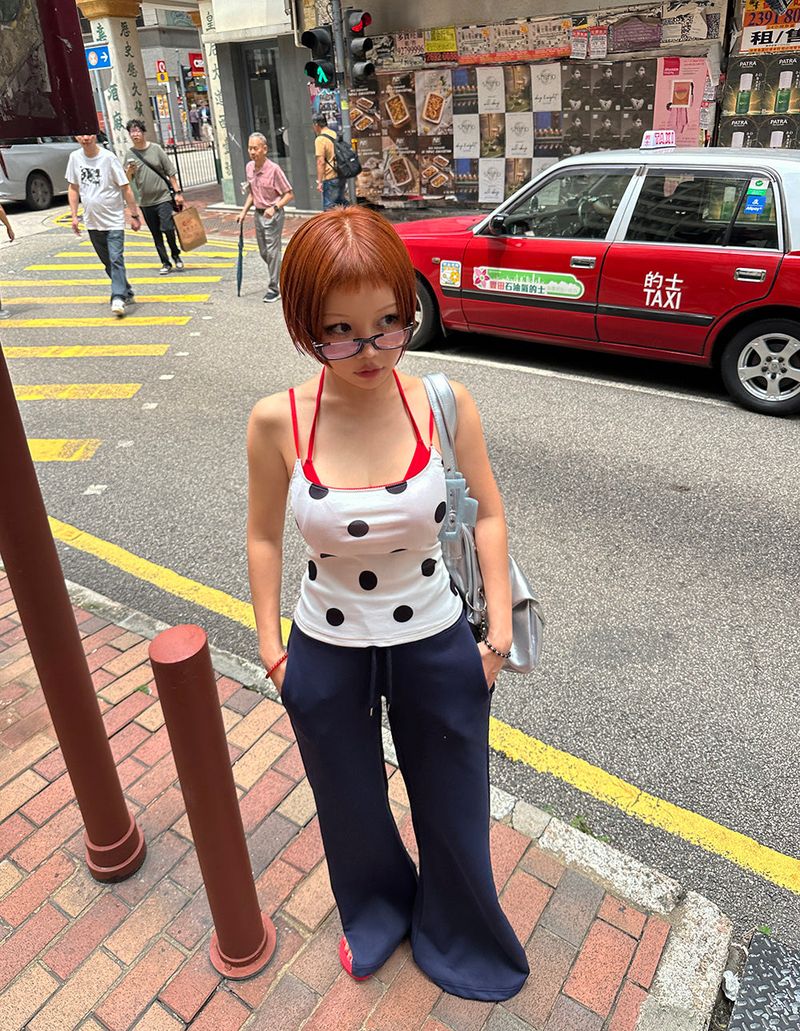 Red colored royal dot sleeveless shirt