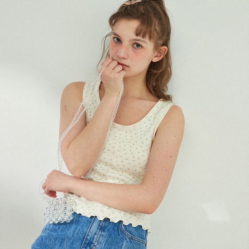 Between A and B（ビットウィーンエーアンドビー）の「SCALLOP PUNCHING SLEEVELESS_CREAM（Tops）」