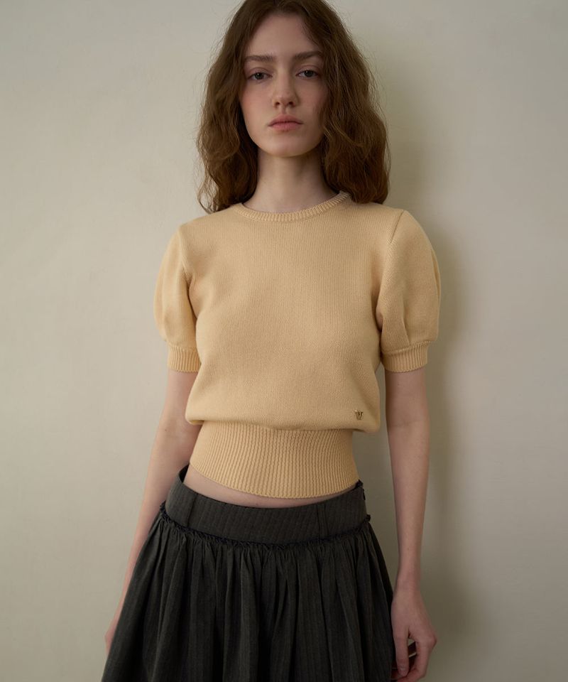 WITHOUTSUMMER(ウィズアウトサマー)の「Slim button half knit_butter(Tops)」