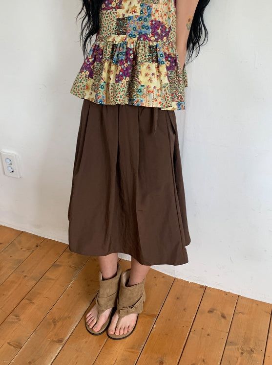 BAON（バオン）の「Hitch Flare Nylon Banding Midi Skirt（Skirts）」