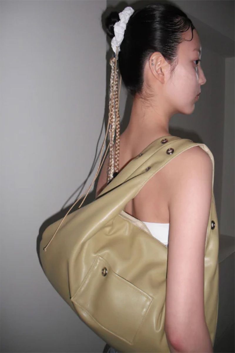 DEPC（デプク）の「EYELET LEATHER BAG - BUTTER（Bags）」