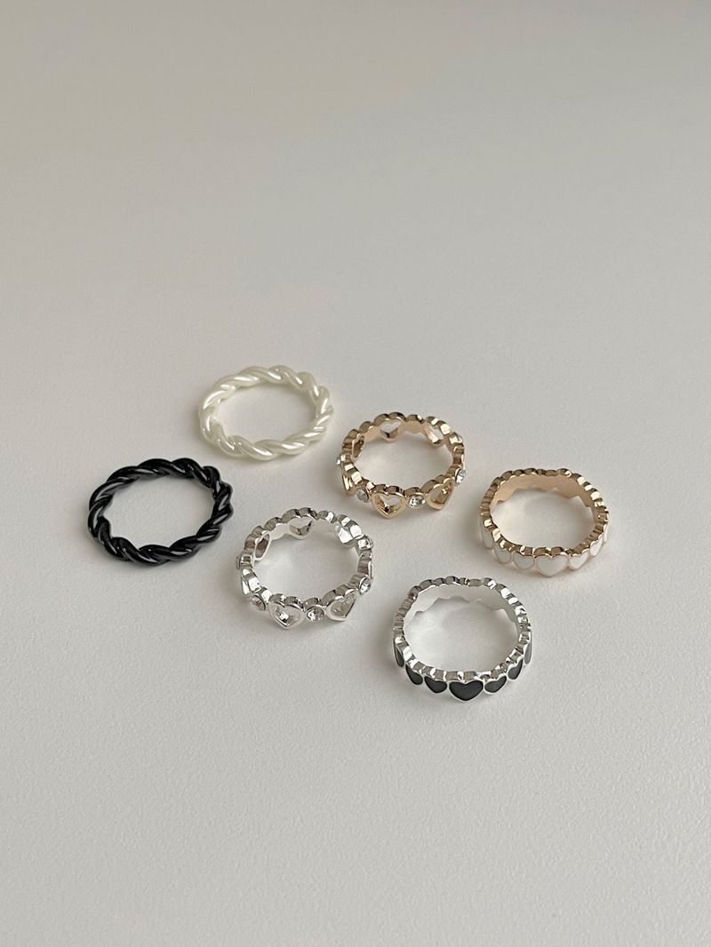 Blingmoon（ブリングムーン）の「[3 set] ツイスティドスワンハートレイヤードリングセット（アクセサリー）」