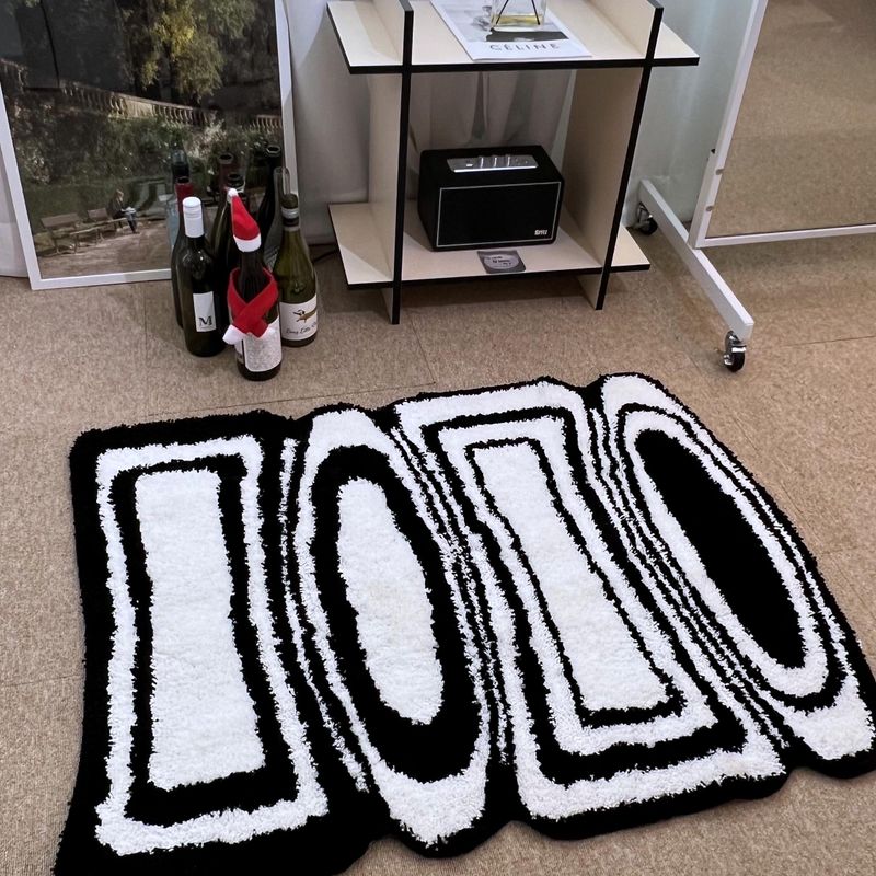 Black & white oval square tufting rug