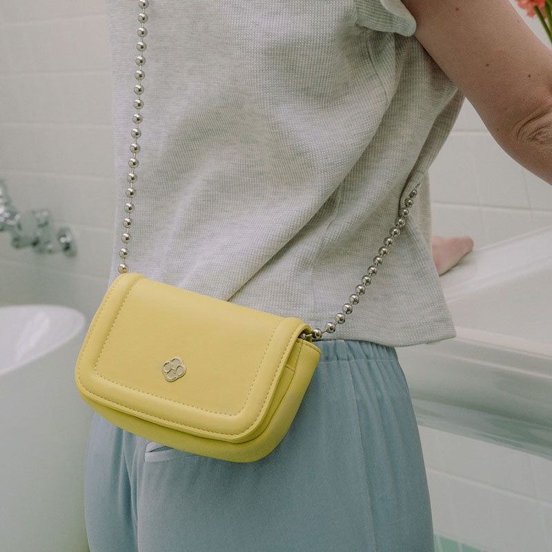 Heeari(ヒアリ)の「Poppy Chain Mini Bag_Yellow(Bags)」