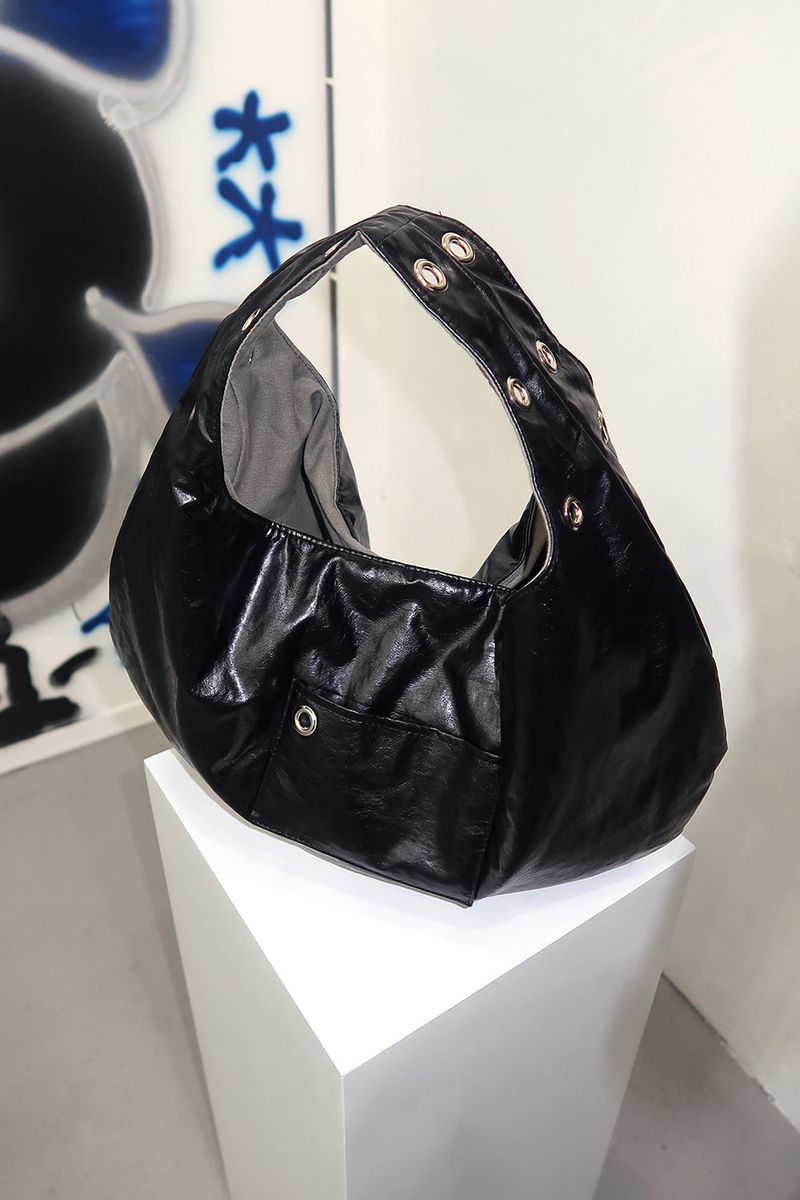 DEPC（デプク）の「EYELET LEATHER BAG - LARGE (BLACK)（Bags）」