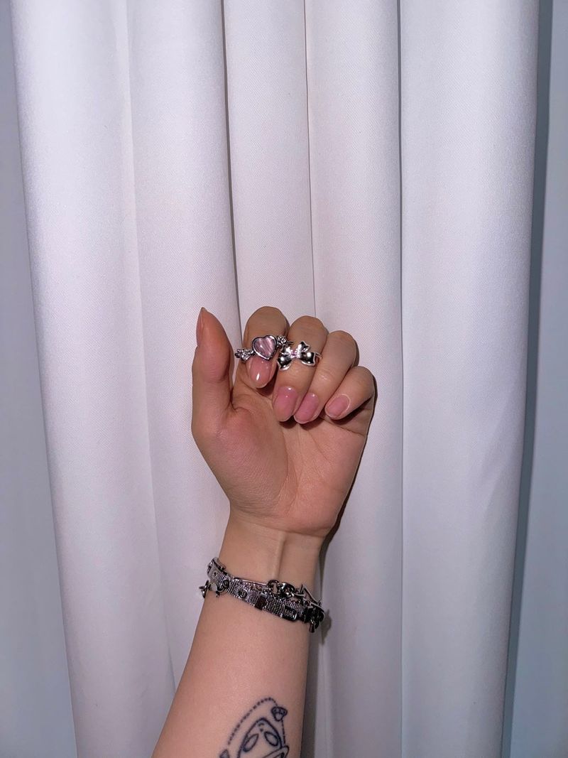 Pink heart angel ring