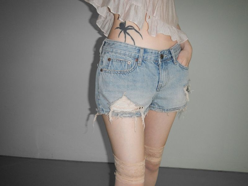 orange destroyed shorts