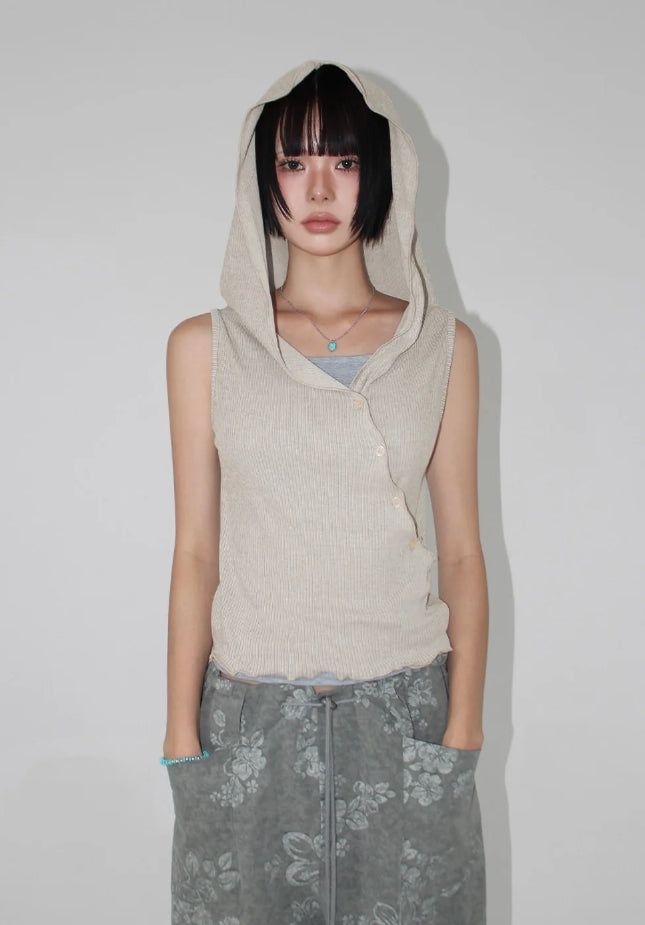 AAKE(アケ)の「DIAGONAL BUTTON HOODED TOP(Tops)」