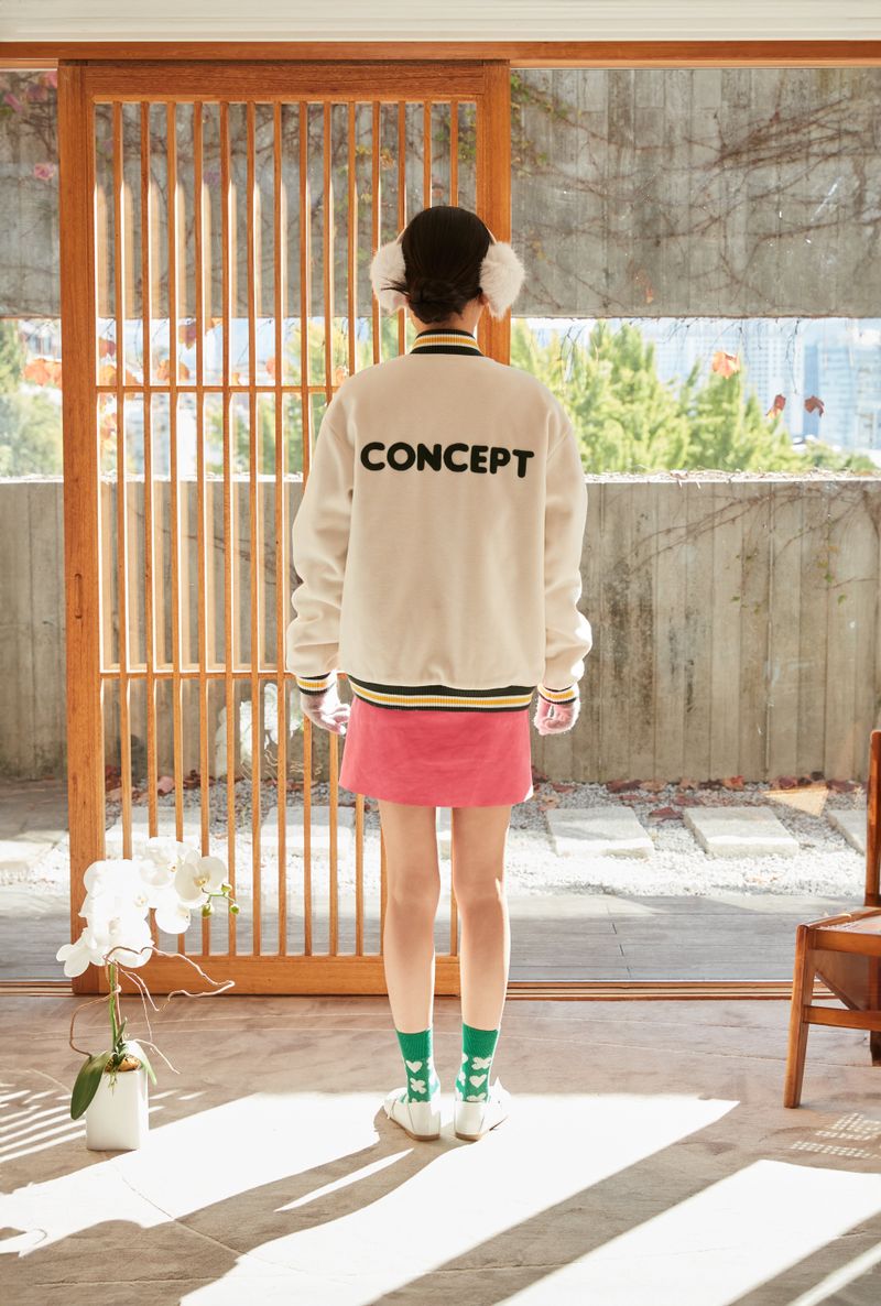 All Ivory graduation cap patch Unisex Varsity Jacket