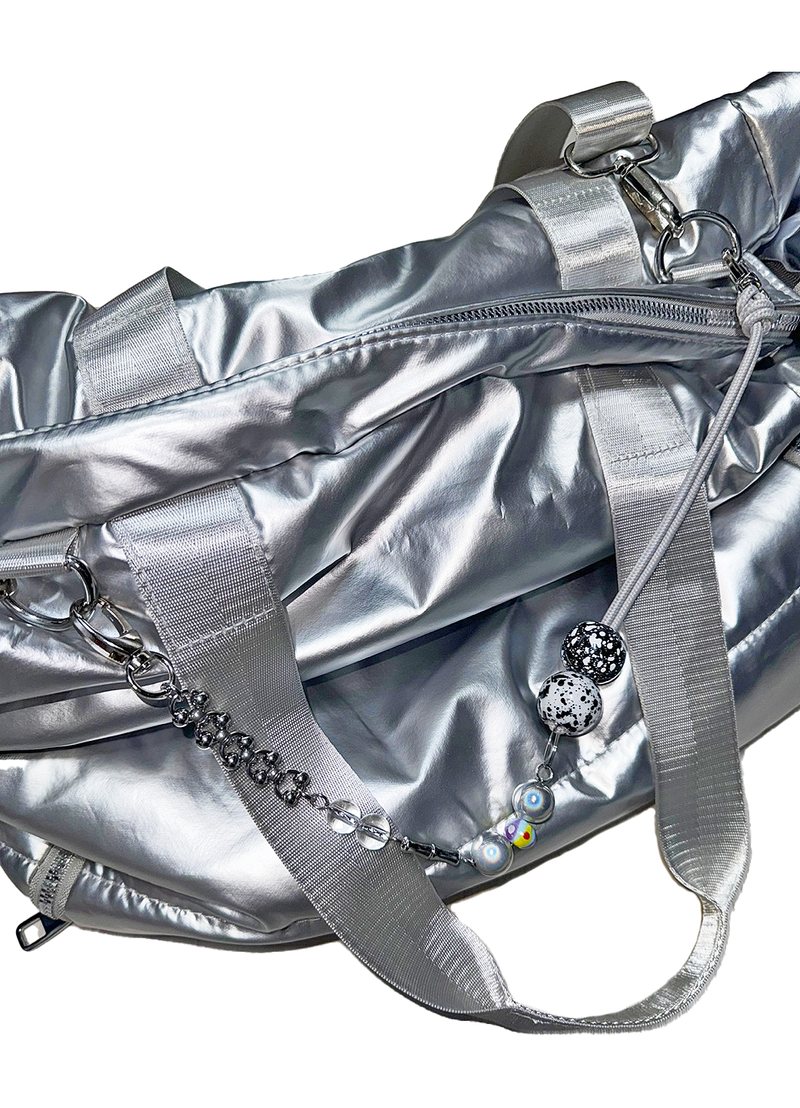 Pierced ball bag chain