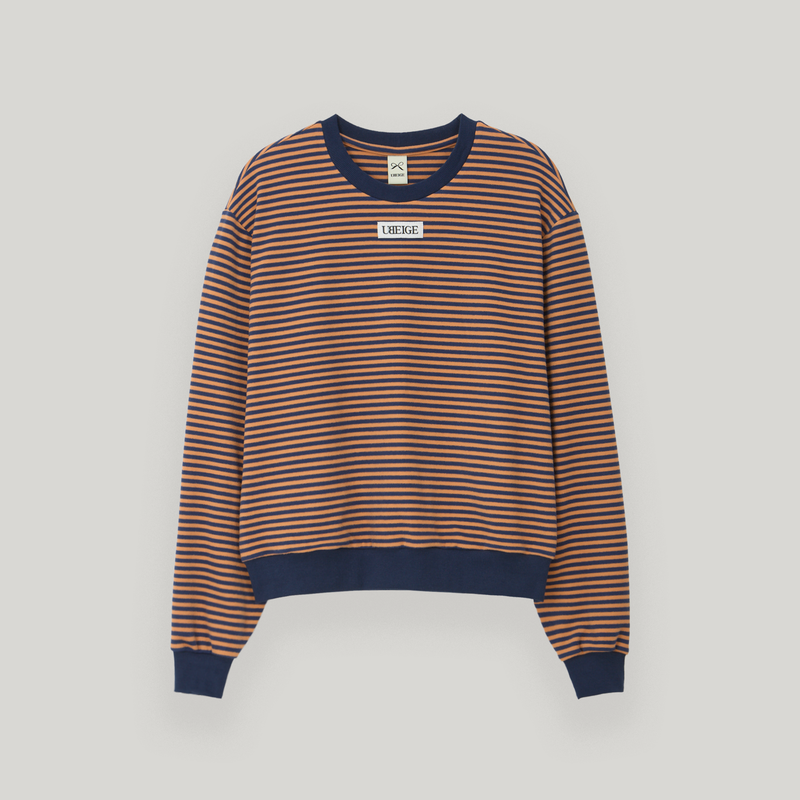 UBEIGE(ユーベイジ)の「Orange/Navy Stripe Fleece MTM(Tops)」