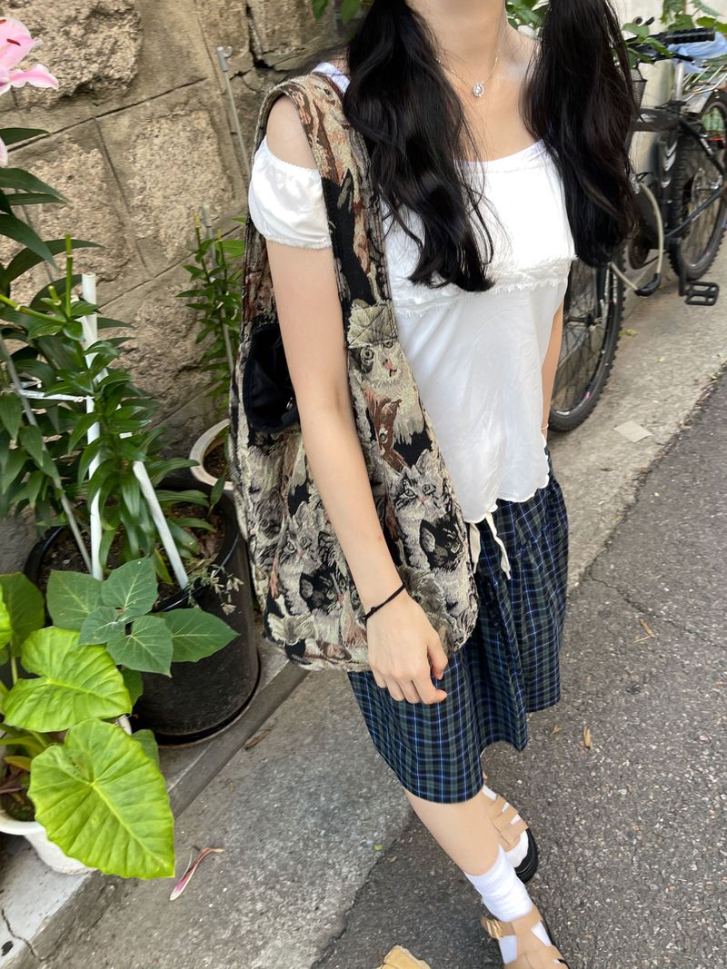 Tommy off-shoulder ribbon sheer top