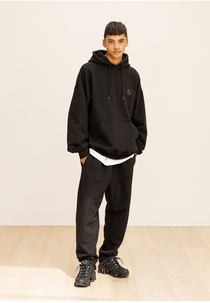 GRATING EMBLEM BACK SLIT ZIP PANTS