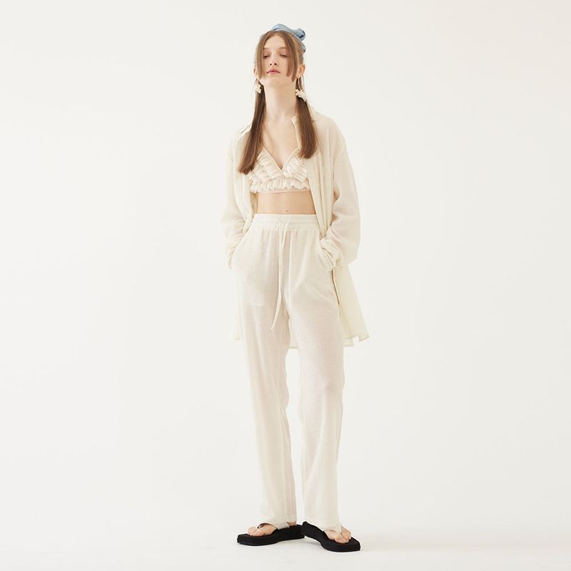 TMO BY 13MONTH(ティーエムオーバイサーティーンマンス)の「PLEATS BANDING PANTS (IVORY)(Pants)」