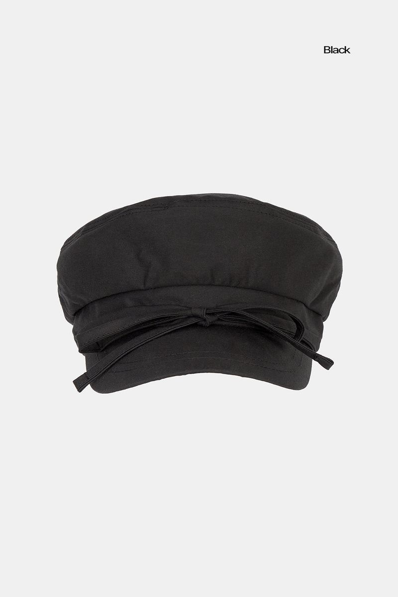 Shelby string newsboy cap