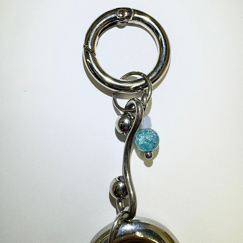 Curved pierce keychain