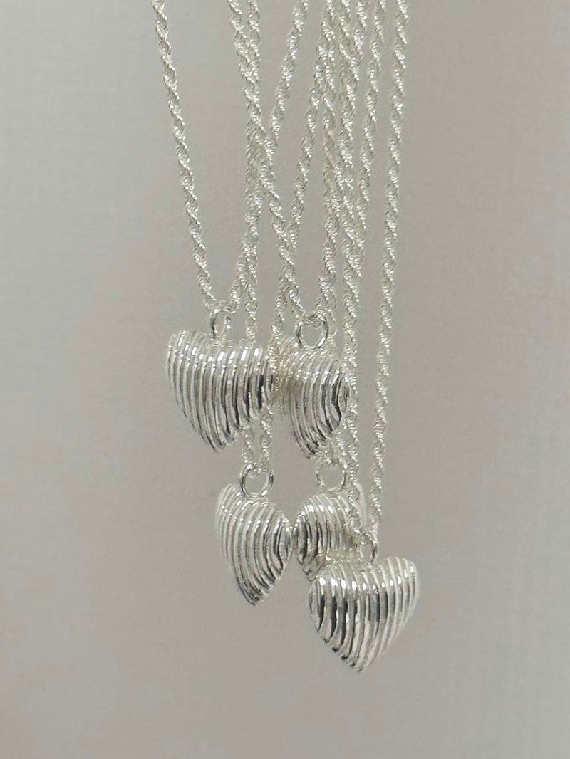 EIGHTMORE（エイトモアー）の「heart shell silver925 necklace natural SV（Accessories）」