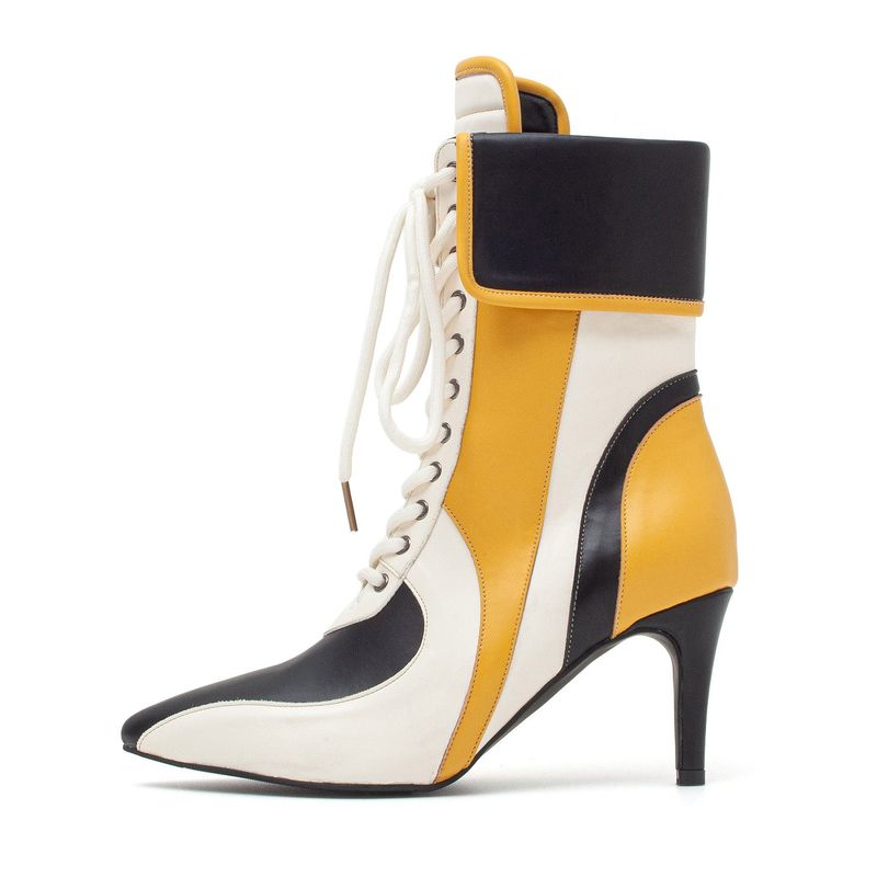 SSIMEEZ（シミズ）の「Color Block Biker Boots Heel(Yellow)（Shoes）」