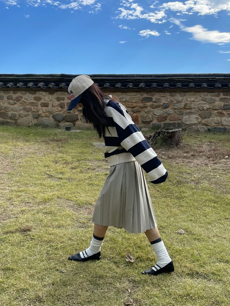 Arco iris(アルコイリス)の「Fringe cut-out midi pleats skirt (Skirts)」