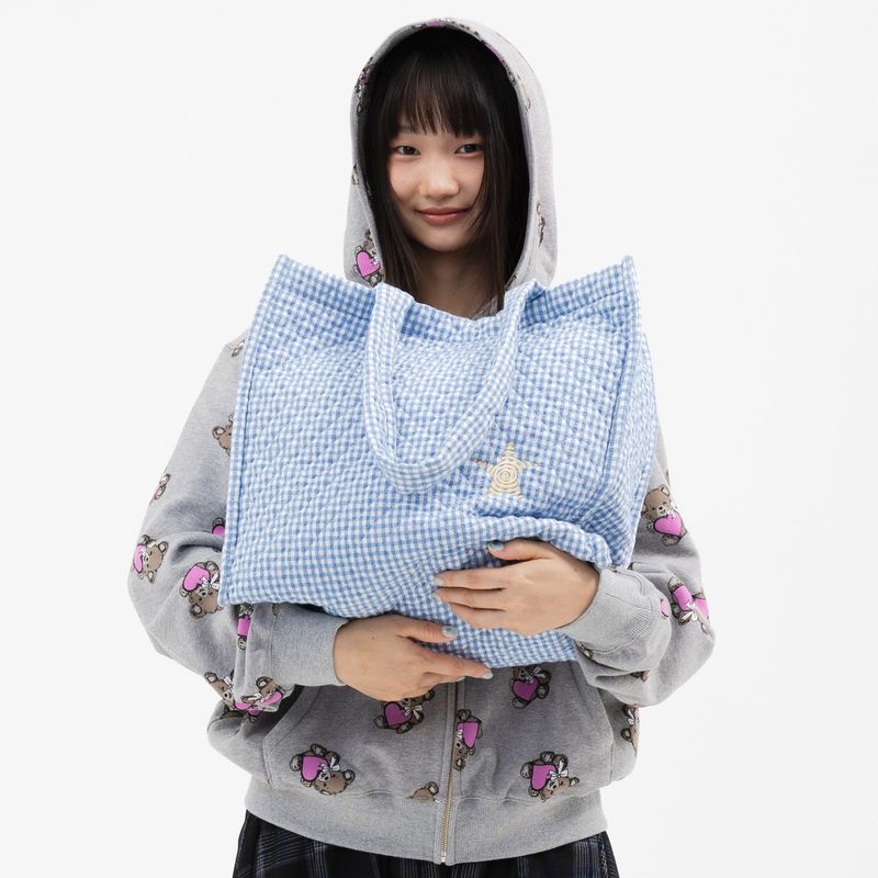 WEBHOUSE（ウェブハウス）の「ツイスター キルト トートバッグ - ライトブルー（バッグ）」