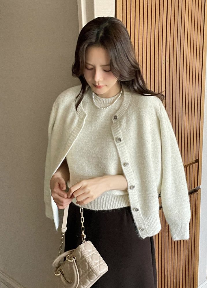 iam mari（アイアム マリ）の「Queenb Sequin Sleeveless Knit Cardigan Set（Tops）」