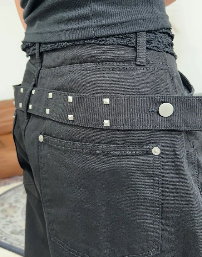Pale studded strap pants