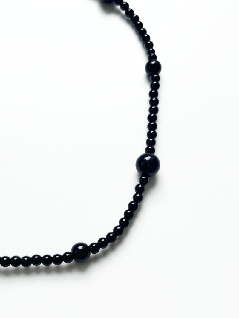Poco pelota necklace