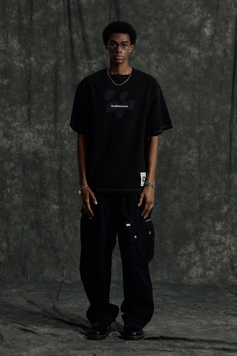 GRAFFITIONMIND（グラフィティオンマインド）の「Logo Pigment T-shirt (Black)（Tops）」