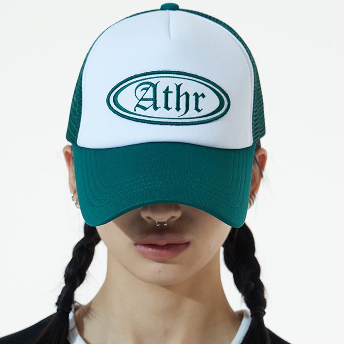 ANDTHEOTHER(アンドジアザー)の「GREEN ATHR TRUCKER CAP(Hats)」