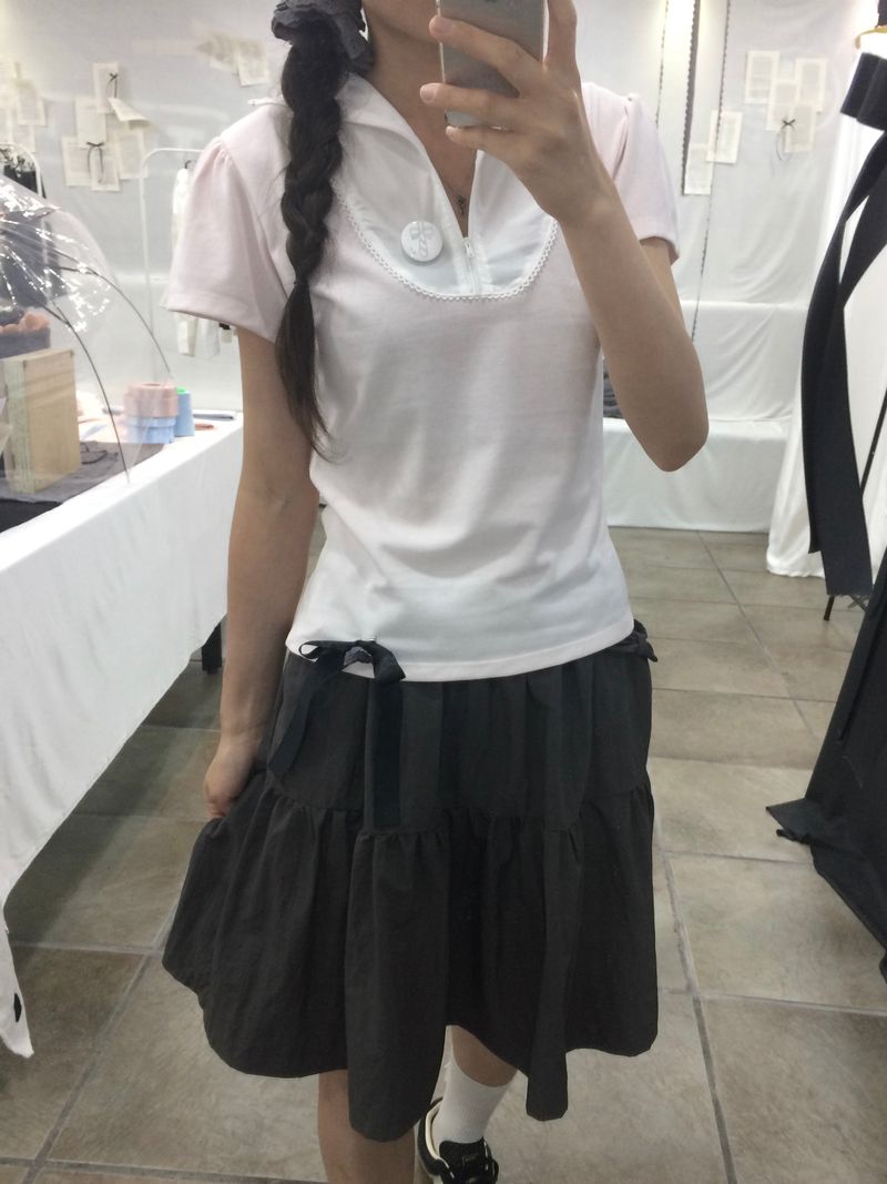 adorntie（アドオンタイ）の「レースジップカラー半袖パフTシャツ(pink)（トップス）」