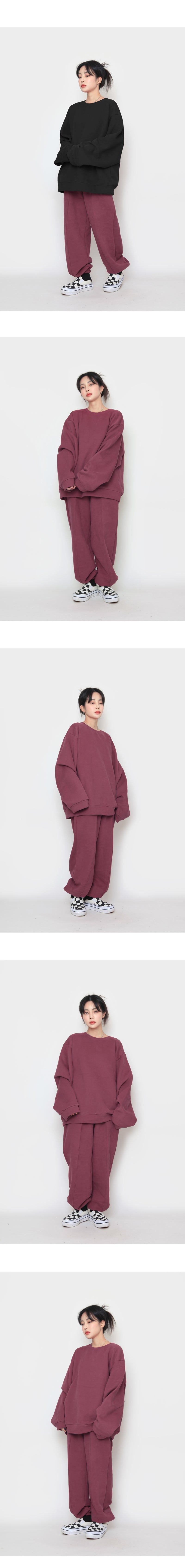 wool over peach sweatshirt
