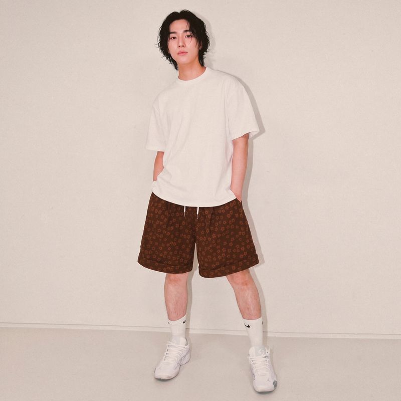 NINENUTS（ナインナッツ）の「フラワーターンアップ ショーツ（ブラウン）（パンツ）」