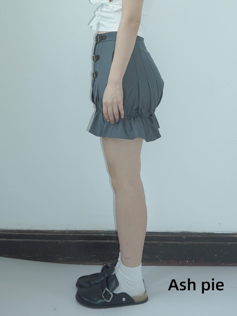 Smocked mini skirt with adjustable buckle