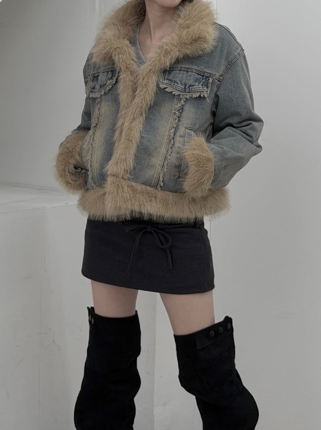 Fur trimmed quilted denim jacket