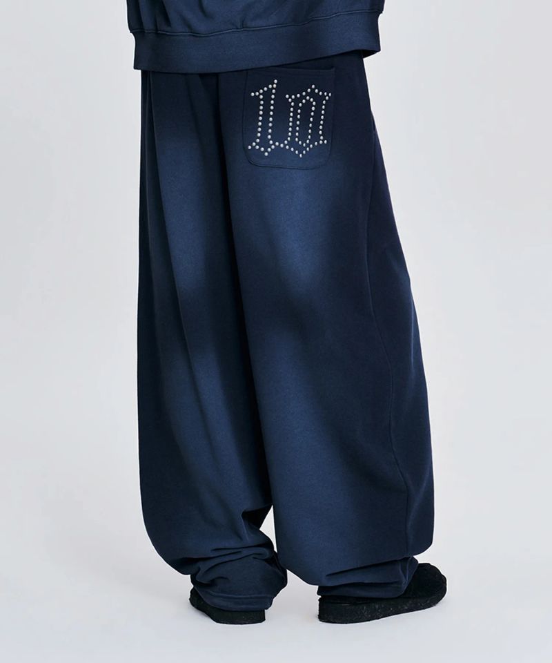 mahagrid（マハグリッド）の「WASHED 10TH THIRD LOGO BALLOON SWEAT PANTS_BLUE（Pants）」
