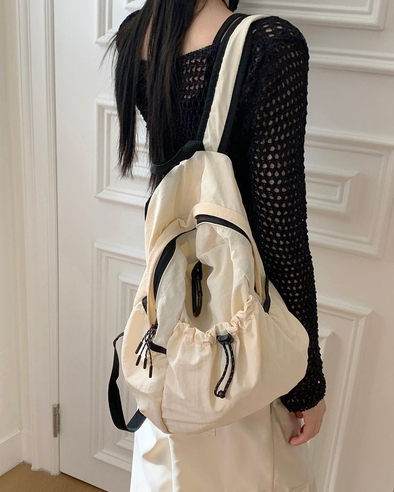 WONDER WONDER(ワンダーワンダー)の「Cliff Coloring String Mini Nylon Backpack(Bags)」